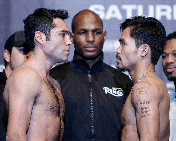oscar de la hoya boxing. A day before their celebrated showdown tonight at the MGM Grand Garden Arena in Las Vegas, Oscar De La Hoya and opponent Manny Pacquiao both made weight for