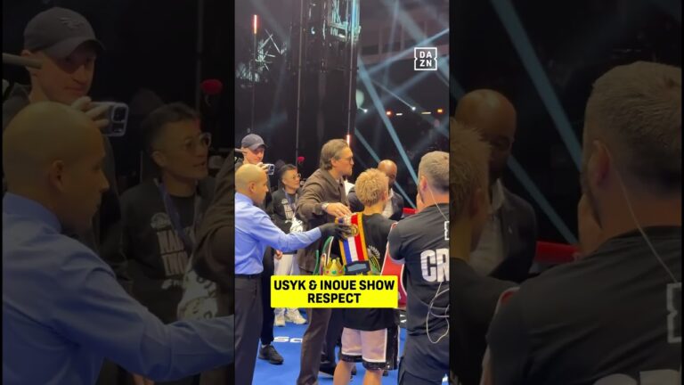 Naoya Inoue embraces with Oleksandr Usyk after his win over Alan Picasso