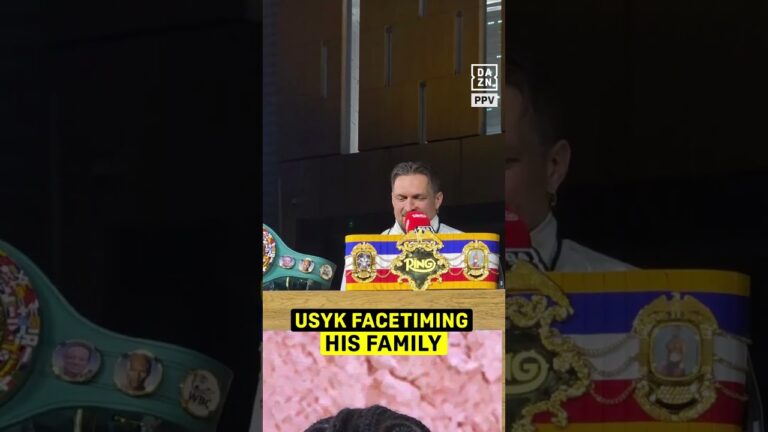 Usyk facetiming his family during the presser! 😅