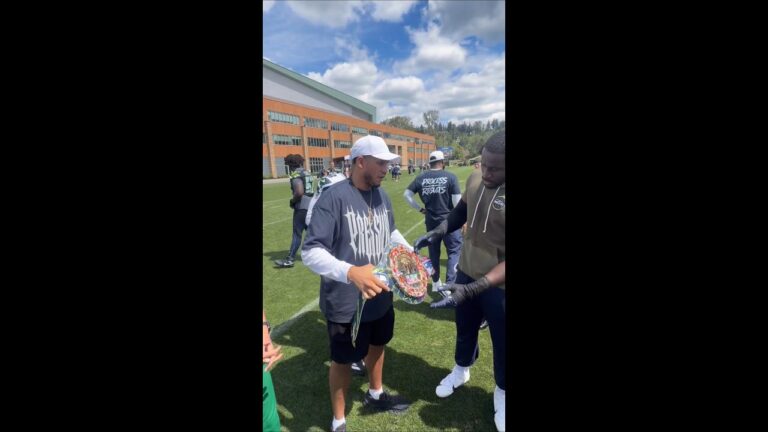 David Benavidez and the Seattle Seahawks Swap Champion Gear