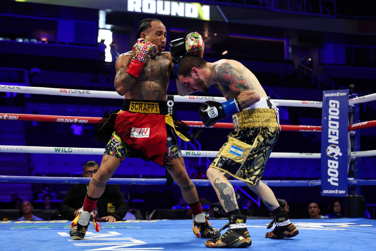 John Ramirez lands a left hand on Lucas Emanuel Fernandez during their super flyweight fight at the SAP Center.