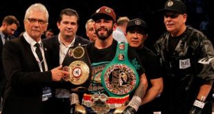 Jorge Linares with boxing belts