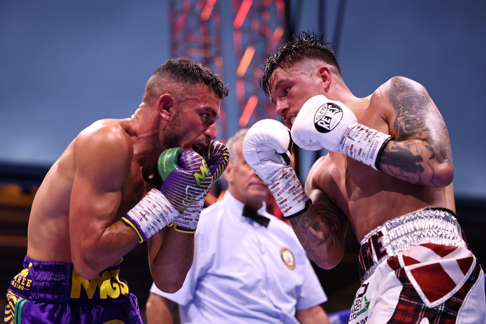 Michael Gomez Jnr and Lee McGregor trading punches during their super bantamweight fight in Doncaster.