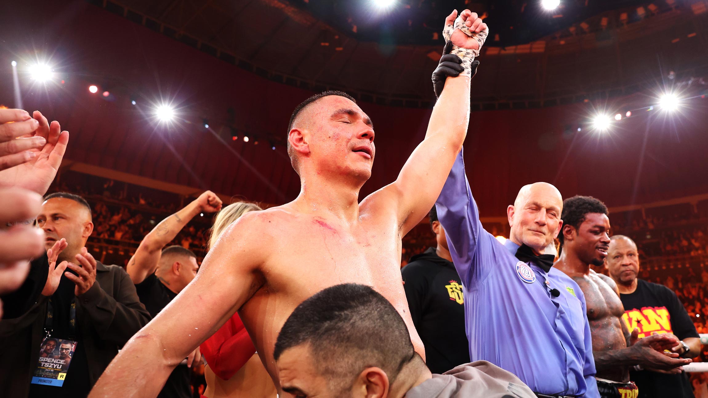 TIM TSZYU EARNS DECISION IN SLUGFEST AGAINST ERROL SPENCE JR.