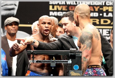  MayweatherCottoWeighIn1 Can Cotto Derail The Mayweather Victory Express?